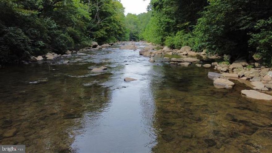 IF YOU’RE LOOKING FOR 10-20 ACRE WOODED WATERFRONT LOTS OR 20 TO 40 ACRE WOODED LEVEL MOUNTAIN TOP WITH DEEDED CREEK ACCESS THAT’S “OFF THE GRID” AND PRIME FOR RECREATION: FISHING, CAMPING, ATV RIDING AND BIG GAME HUNTING OR JUST AN END OF THE ROAD GET-A-WAY, THIS IS IT!  ABRAMS CREEK RETREATS IS SANDWICHED IN BETWEEN TWO ADJACENT MOUNTAINS WHERE THE CREEK SPILLS INTO THE POTOMAC RIVER.   OAKMONT, WEST VIRGINIA IS A LOW-DENSITY COMMUNITY WHERE PRIVACY MEETS REMOTENESS AND SECLUSION.   10 - 15 ACRE WATERFRONT LOTS RANGE FROM $7,795/ACRE TO $8,990/ACRE, PRIVATE MOUNTAIN TOP PARCELS RANGE FROM 20 to 40 ACRES OFFERED AT   $3,995/ACRE TO $4,995/ACRE. ALL MINERAL AND TIMBER RIGHTS INCLUDED.  “NO HOME OWNERS ASSOC. (H.O.A.)…NO RESTRICTIONS”. . EVERY PROPERTY OFFERS THE WIDE-OPEN SPACE AND PRIVACY THAT YOU’VE BEEN LOOKING FOR.   CALL FOR  APPOINTMENT…MAKE AN OFFER!!