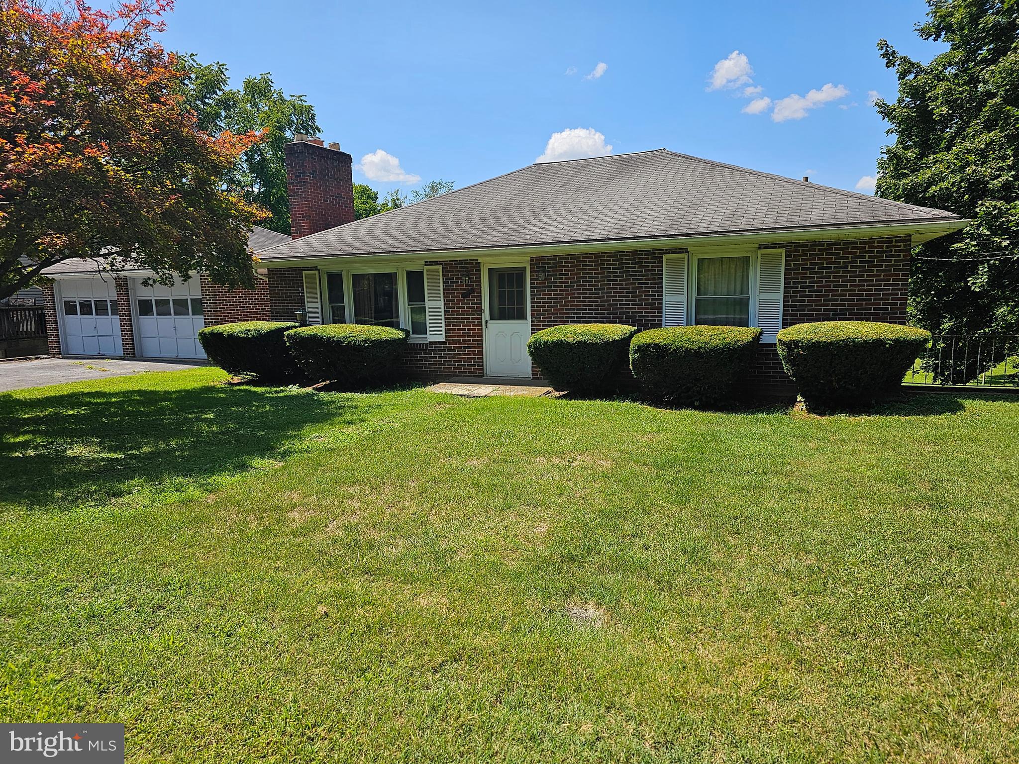 This property is being sold AS-IS, the seller is not paying for any repairs. There is a lot next to the house that is being sold with the house. The property is located in a flood zone because of the small stream located by the back property line.
The property has a lot to offer, large living, 3 bedrooms, 1 full bath on the main lever, and 1 full bath in the basement. The kitchen door leads outside into the breezeway to the 2 car garage.
The basement could be finished into living area.