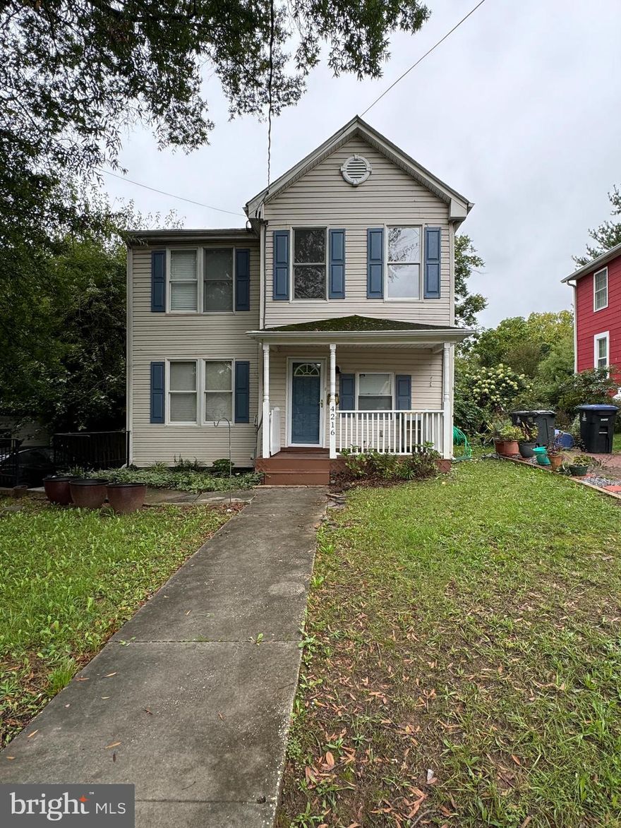 Renovated charming colonial in sought after Mount Rainier.  freshly painted through out with warm light grey paint. Updated bathrooms, and kitchen. Large deck off kitchen and fenced in backyard. Large off street parking,