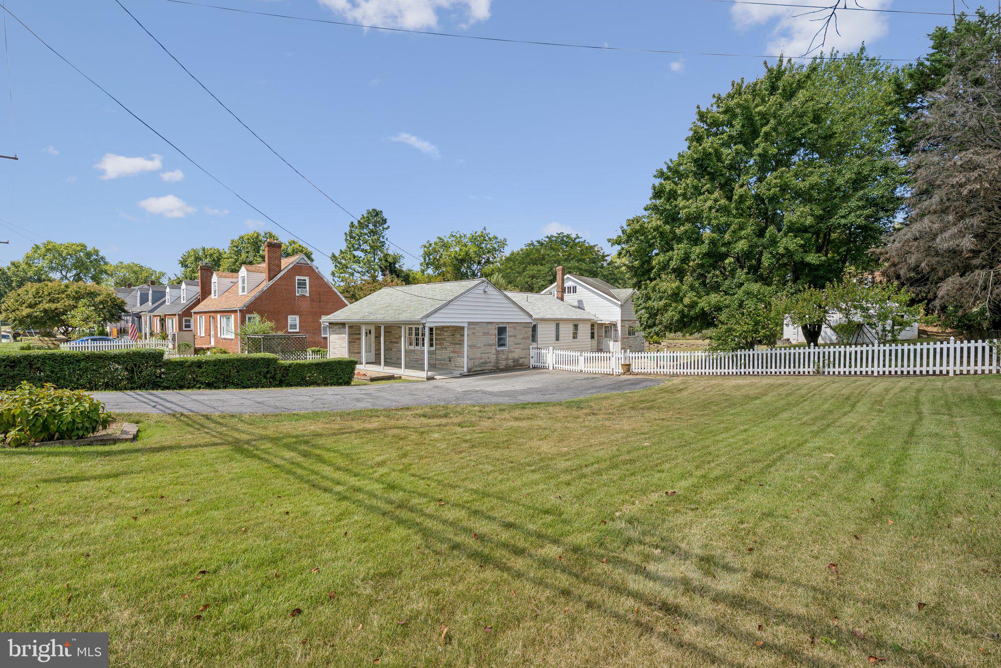 A unique opportunity in Temple Hills! This spacious 5-bedroom, 2-bath home sits on a rare double lot being sold together, each parcel .19 acres, offering endless potential for both residential and investment use. (Home is being sold "As-is".). Enjoy the ease of one-level living with flexible space that could serve as a comfortable principal residence or possibly be configured into two rental units. The property boasts ample parking for 8+ vehicles, with four separate exits (two in the front and two in the back) for added convenience. A highlight of this property is the detached garage (1200 square feet, with electricity), ideal for parking, a workshop, or even a private studio.
Enjoy the convenience of easy access to local parks including Temple Hills Park and the scenic Henson Creek Trail, a 5-mile paved path perfect for walking, biking, or jogging. The nearby Temple Hills Community Center provides a range of fitness classes, playgrounds, tennis courts, and gathering spaces, while the area also features public and private swimming facilities. For entertainment, the property is less than a 15-minute drive to MGM National Harbor Resort & Casino, featuring world-class dining, luxury shopping, live performances, and vibrant nightlife along the Potomac River. With its balance of neighborhood amenities, recreation, and proximity to National Harbor and Washington, D.C., this location offers something for everyone.
The following lots of corresponding tax ID numbers are included in and shall be conveyed as part of the sale: Lot 3-Tax ID: 12-1357268 & Lot 4 Tax ID: 12-1357276