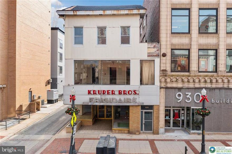 Exceptional Redevelopment Opportunity in the Heart of Allentown’s NIZ District. Positioned on a high-visibility corner lot across from the redeveloping PPL Tower and steps from the Archer Music Hall and Da Vinci Science Center, 926-928 W Hamilton Street sits squarely in the path of Allentown’s next wave of growth. The property spans a 30’ × 230’ parcel—a rare oversized footprint in the city core—with rear access adjoining the Maple Street Parking Deck, offering convenience and potential parking advantages.

This three-story mixed-use building can be reimagined for retail, restaurant, office, or residential use, or redeveloped entirely into a new vertical project leveraging full NIZ benefits—where most state and local taxes generated can help finance eligible construction improvements.  Highlights include: * Prominent corner visibility and signage potential along W Hamilton Street, Direct adjacency to the Maple Street Parking Deck for abundant customer and tenant parking, 30' × 230' lot offering depth and redevelopment flexibility, Located within Allentown’s NIZ, fueling more than $1.4 billion in new investment, Surrounded by 1,500+ new apartments, 14,000+ office workers, and major entertainment anchors. Whether repositioned, expanded, or redeveloped from the ground up, 926-928 W Hamilton Street offers a premier footprint in Allentown’s fastest-rising corridor, ideal for investors and visionary developers alike.