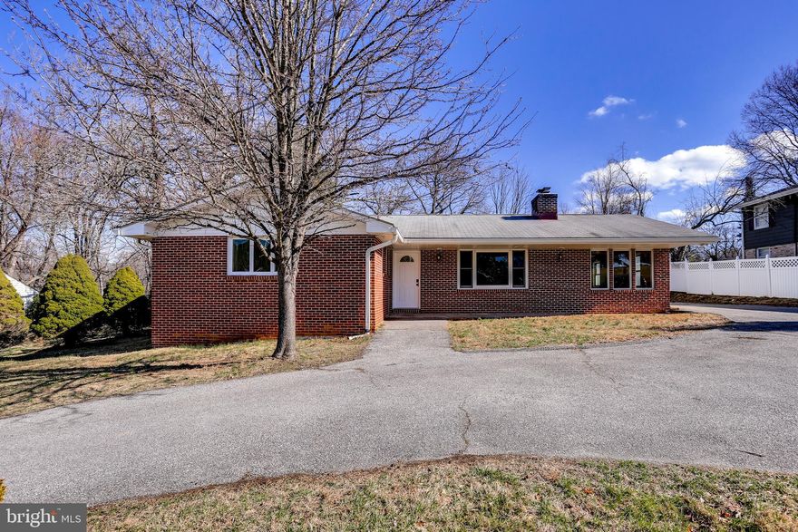 Fully Renovated and Move-In Ready! Come see this gorgeous brick front rancher on nearly half an acre in the desirable Mt. Hebron neighborhood. Entire home freshly painted. All hardwood flooring refinished (including bedrooms) and all new carpet installed throughout. The renovated kitchen features custom cherry cabinets, granite countertops, a gorgeous stone backsplash with elaborate detailing, all brand-new stainless-steel appliances and elegant porcelain tile floors. Highlights of the living room include a beautiful stone front wood burning fireplace (plus heatilator) with lovely built-ins on each side and a large window. The family room off the kitchen is bright and inviting with large windows on three sides and access to the rear yard. The fully renovated master bathroom and hall bath each feature exquisite tile work with custom border detailing, new vanity, sink, toilet, and chic LED mirrors with touch switches. The lower level is improved with a large recreation room, a 4th bedroom (with bathroom rough-in), and large storage area. Walk-up access to a large level rear yard. The extensive home upgrades continue with new Anderson windows on the main level, new electric hydronic baseboard heaters in the family room and basement, a new 200 AMP electrical panel with brand new wiring, outlets and switches throughout the home, a brand new high-efficiency gas boiler, new water heater and new plumbing throughout. The exterior was not forgotten with all new siding, eaves, soffits and gutters.  All of this plus a desirable location in sought after Ellicott City with top rated schools. Since 2005, Ellicott City has been ranked four times among the top "20 Best Places to Live in the United States" by Money and CNNMoney.com.  It is part of the Baltimore-Washington Metropolitan Area and convenient to major highways such as route 29, 70 and 100.  This property is minutes from grocery stores, parks, restaurants and retail stores. Ellicott City also features a downtown historic district which is a very popular destination with antique shops, eclectic boutiques, restaurants, coffee shops, and several historic sites. Come make this nearly maintenance free home in one of the best locations yours today!