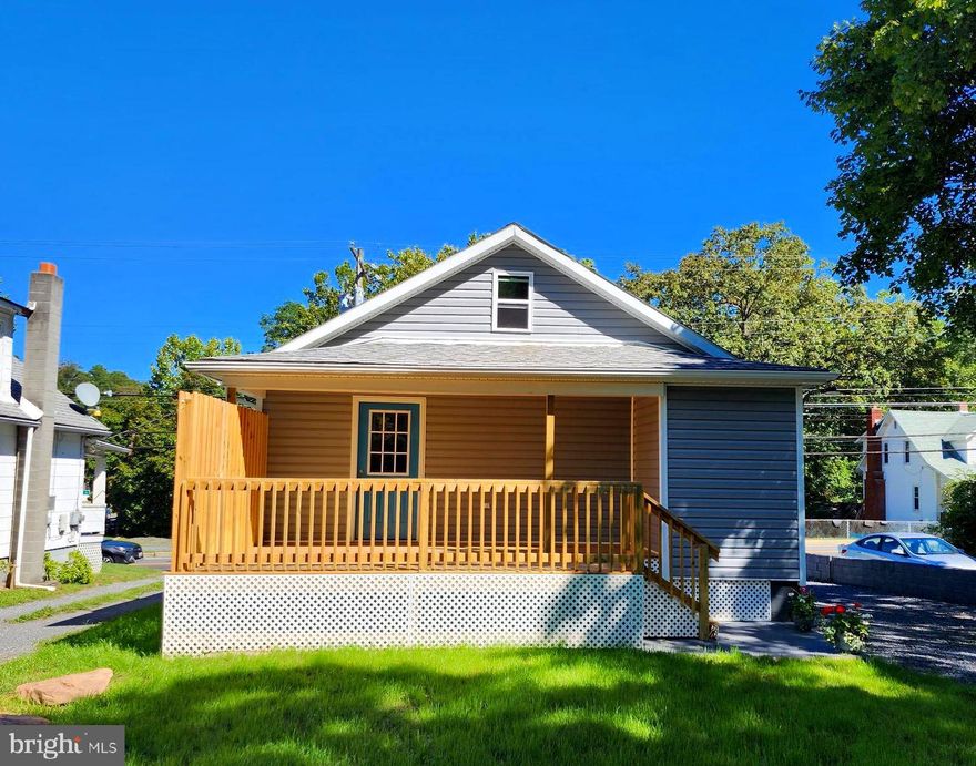 Total Makeover! This beautifully remodeled home features a brand-new roof, siding, and windows. The kitchen has been upgraded with sleek stainless steel appliances and elegant granite countertops. Enjoy the luxurious new baths and a spacious recreational room. With 4 bedrooms and 2.5 baths, this home offers ample space for comfortable living. The deck overlooks serene woods, providing a peaceful retreat. All kitchen appliances convey, and there's convenient parking available. Move-in ready and waiting for you to make it your own. Schedule a tour today!