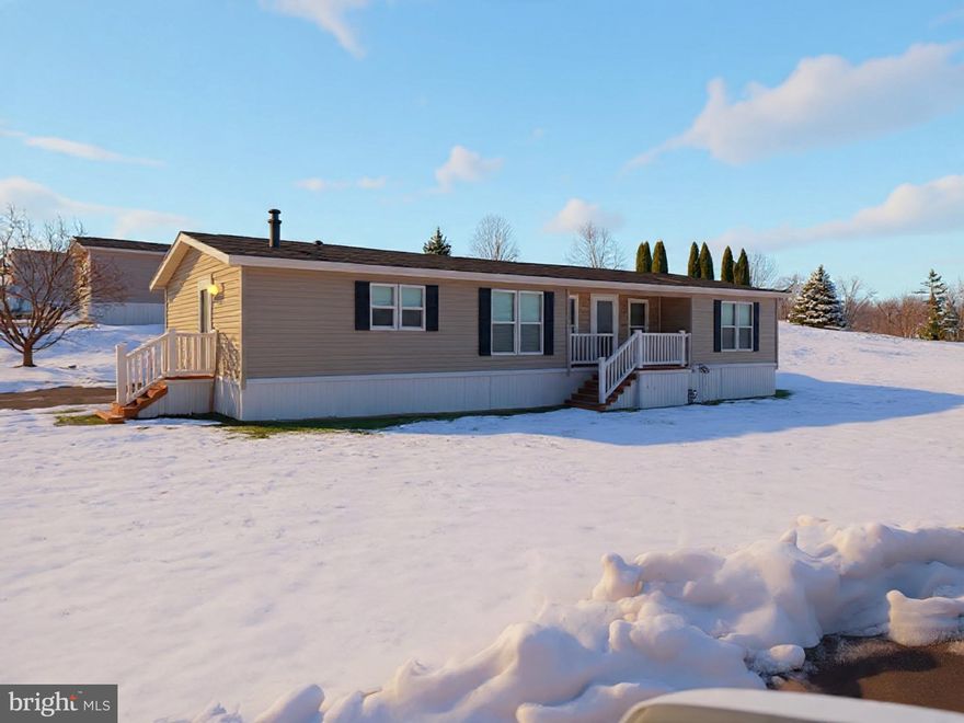 Beautifully updated 3-bedroom double-wide in a scenic 55+ community. 
Welcome home to this beautifully updated double-wide mobile home, built in 2007 and offering 1,616 square feet of comfortable living space.  Located in a very well-maintained and picturesque 55+ mobile home park.  This home combines modern updates. Inside, you’ll find three spacious bedrooms, along with fresh paint throughout and brand-new luxury vinyl flooring that adds both style and durability.  The living area is warm and inviting, featuring a stone fireplace (propane) – perfect for cozy evenings at home. 
This home has been thoughtfully upgraded with a brand-new roof and all new appliances, including washer and dryer, all of which are included in the sale. The side steps leading to the entrance have been replaced with brand new composite decking, offering both durability and low maintenance appeal.  Property also offers two off street parking spaces for added convenience.  As an added bonus the home features all new furniture, which is available for purchase separately, making this an excellent move-in ready opportunity. 
Enjoy low maintenance living in a beautiful and comfort, space, with updates you’re looking for.  This home is truly move-in ready and a must see!