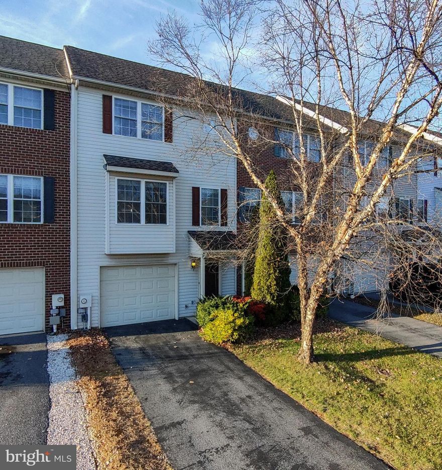 Welcome to this charming 3 bedroom, 2.5 bath townhome in the desirable community of Hammonds Mill. This spacious home offers three finished levels making it move-in ready.  The finished lower level boasts new luxury vinyl plank flooring and provides a bonus room that could be used as a playroom, home office, gym or extra family room.  The main level features an open concept layout with a bright kitchen and large family room with hardwood flooring and access to the deck.   Upstairs you will find a spacious primary bedroom with a tray ceiling, walk-in closet, and an en suite bathroom. Two additional bedrooms have generously sized closets and share a bathroom.  This home also offers a one car garage.  Perfectly located close to commuter routes, schools, shopping and restaurants.