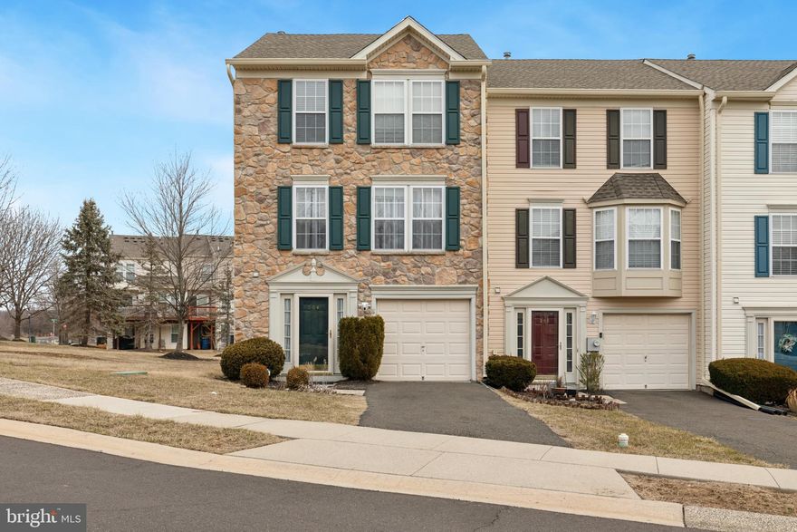 Enjoy a comfortable suburban lifestyle with city-like accessibility to everything! This beautiful 4 bedroom, 2.5 bath End-unit townhome is  just a stone's throw away from major highways, multiple train stations, shopping, restaurants, entertainment, employment, schools and more. This gracious stonefront home is in the desirable Terrace at Montgomery community. Recently painted with an abundance of natural light. Enter the tile entrance foyer that leads to the Walkout finished basement which could be used as a fourth bedroom or recreation/office space. The main level comprises of the spacious Living room w/laminate floors, tiled kitchen, dining room and and a radiant sunroom with walls of windows. Sliders on the main level lead to the huge deck that has beautiful views of green space. The kitchen is well appointed w/several cabinets, tile backsplash, stainless steel appliances, granite island and countertops. The upper level has the spacious Master bedroom with a vaulted ceiling, ceiling fan, 2 walk-in closets and attached Master bath w/stall shower, tub and double vanity. Two additional guest bedrooms and a guest bathroom complete this floor. Recessed lights on all levels in the home is a big plus. One car attached garage with additional parking on the driveway as well as guest parking lots. Additionally enjoy access to the Montgomery Township Community and Recreation center for being a resident in this coveted township. N Penn School District. Landlord pays HOA dues. See it soon !!