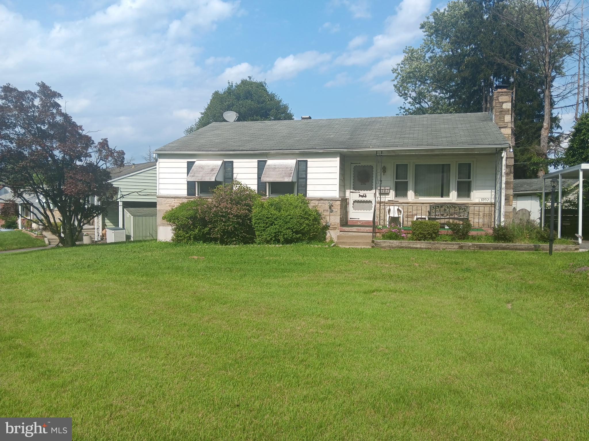 Estate Sale. Occupied - NO TRESPASSING! Sold Strictly As-Is. 3 Bedroom, 2 Bath Rancher on prime corner lot features driveway and fenced backyard. House in need of major rehab. Cash or Conventional only.