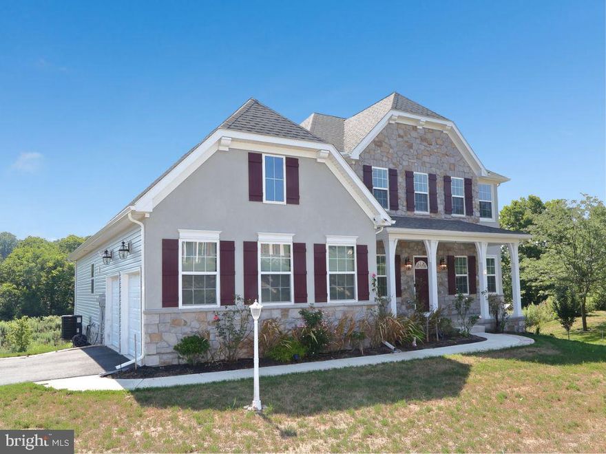 An absolutely amazing home in The Summit at Stonemill in Elizabethtown. Barely 2 years old, you’ll appreciate all the amenities this home has to offer. The kitchen is incredible with tons of cabinetry including accent lights in the top tier of the cabinets, granite countertops of course, a pantry, recessed lighting, a huge island and a breakfast area that accesses the composite deck that leads to the yard. Let’s talk about the family room, there is a cozy gas fireplace, but the windows will grab your attention with all the natural  sunlight they provide, and you’ll quickly notice the family room is open to the second floor/ loft area. The first floor is quite accommodating with a formal dining room that boasts of a tray lighted ceiling and also a convenient office. In addition, take a stroll to the spacious  primary bedroom, again with lots of natural light and generous  space, along with two walk in closets. The primary bath, oh my, is stunning: a double bowl elevated  vanity, a bathtub and best of all, a huge walk in tile shower that overlooks the rest of the bathroom through a frame glass. The flooring throughout the first floor is mainly luxury vinyl plank with some carpet and ceramic tile. 
   Let’s take a trip upstairs to three bedrooms, two of which have walk in closets and all of them are desirable in size. Add in a second full bath along with the loft area that overlooks the family room. The  basement consists of poured walls, fully insulated, a sliding glass door to a patio plus the roughed in plumbing for another bath, great when the lower level is finished space. Some additional features are the passive radon system, the upgraded water conditioner, the natural gas furnace and water heater. Outside you will notice all of the room to roam around, plus the crisp landscaping, and custom shed. Add in the side load two car garage and magnificent view of the property with a wooded area in back. Schedule your time to take a look!