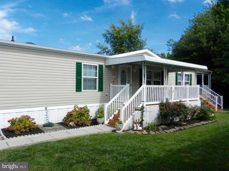 MUST SEE!!  Luxurious 2004 Manufactured Home In Biscayne Bay - Private Setting Backs to Woods On Saltpeter Creek Watch The Deer From Porch - Spacious Kitchen w/ Designed Glass Cabinets - Gas Fireplace - Too Many Upgrades To List - Many Home Furnishings Are Available For Sale - Buyers Must Be Park Approved Park Rent Currently $551.00 Month - Pets Allowed with Permission- SHOWS LIKE A MODEL!!!