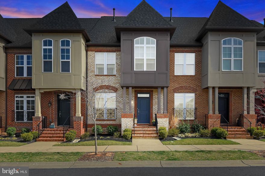 Beautifully upgraded townhome in the highly sought-after East Church community! This stunning interior unit showcases modern, exquisite touches throughout, offering an abundance of natural light and an open, inviting layout. Enjoy cooking and entertaining in the gourmet kitchen, complete with high-end finishes and generous counter space. The cozy living room with a fireplace creates the perfect setting for relaxing evenings at home.

Upstairs, you’ll find spacious bedrooms, including a luxurious primary suite with a full bath. The upper loft with its own private terrace provides an ideal space for a home office, lounge, or additional guest area. The finished basement offers even more versatility—perfect for a recreation room, gym, or media space.

Step outside to the private patio and enjoy easy access to the two-car detached garage. Located in a low-HOA community with fantastic amenities, this move-in-ready home delivers comfort, style, and convenience in one of Frederick’s most desirable neighborhoods.