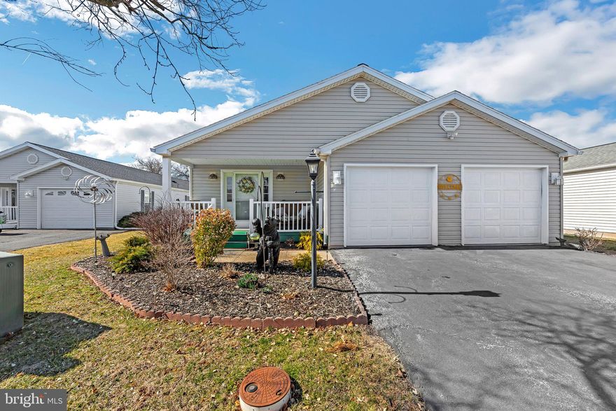 Offered for the first time in the village of Willow Run is this Country Manor model with many attributes. Larger footprint - 1592 square feet. Step into the foyer with coat closet and take note - beautiful wooden 6 panel door. Living room opens off to the right with a short hall to a full bath with single sink vanity and tub/shower combination. The living room  leads to a beautiful set of double doors showcasing what is  currently used as a bedroom. This is pivotal space, and can be used interchangeably - den, office, formal dining room, sewing room, train set up or a pool table! Opposite this bedroom is the  eat-in kitchen with a pass through over the sink that opens into the living room. Kitchen island, updated appliances, granite counter-tops, extra storage alongside refrigerator and a walk in pantry! China closet wall can handle extra cabinetry or a desk if needed. Sliding door leads to a side porch. Laundry room is extra special with sink, room for freezer, extra fridge, sewing machine or utilizing space for simply storing vacuums or perhaps a litter box! A closet houses the hot water heater behind a panel, and the heater and whole house water shut off are located here as well. The primary bedroom is large and comfortable. Pictures show how well the room can  accommodate furniture. Primary bath offers a single sink vanity, shower and larger space overall. 2nd bedroom is now a designated "man cave" as noted on the sign resting on the bookcase. Oversized two car garage, extra storage in garage itself and pull down steps to overhead storage. A small service door leads to the backyard and side porch.

Preapproval from Longview Management required for all residents moving into community.
Lot lease covers trash, once weekly, snow in street, CAM, pool and clubhouse