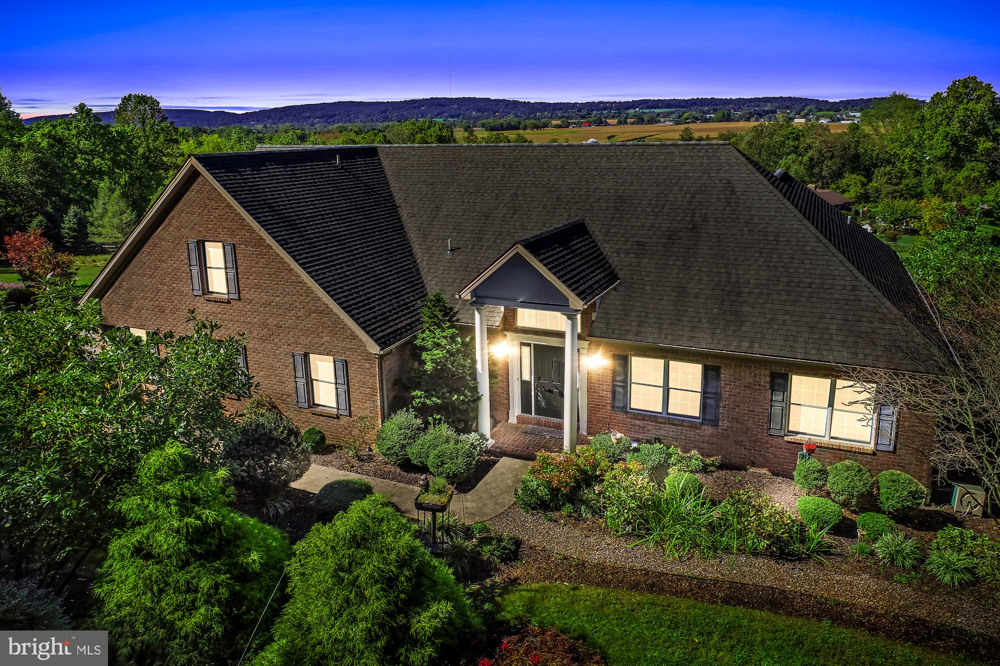 This grand estate could be the last home you'll want & have to purchase.  What makes this home the top candidate for your final move? This home offers over 2700 square feet just on the first floor for one floor living at its finest! This home was custom-designed to provide space for a variety of needs.  Bonus rooms and perhaps private indoor retreats will positively surprise you.  Take the Master bedroom suite where you'll find a room dedicated to prayer & meditation, and another room as a private office.  And this bedroom suite also boasts of a palatial master bath and large walk in closets.  And there's more to "find" on the first floor-- there's a traditional living room with a fireplace, a sunroom with views of the valley (enjoyed especially on slow weekends by the current owners), and a den, all offering versatility to suit your hobbies and needs.  The second floor is a great space for the children or perhaps overnight grandchildren where you'll find two bedrooms and a full bath.  We're not done yet! The finished basement could play host to your larger gatherings, and offers a very large open area employed as a dance floor, or you could use this area for an awesome home gym.  The basement also offers great versatility in space and hosts the convenience of a full bath.  The final expanse of space is perhaps the most inspiring for your golden years' activities.  This estate enjoys a stunning view of the valley and across to the Hellam Hills.  Simply enjoy this view from the large dedicated pergola area, or from the gazebo which is rumored to be a great place to read.  Pass your time crafting these gardens and the pond area of this beautiful property.  But you'll have to share this yard with a family of deer and turkey who regularly trek through.  Nearby amenities to support a life of leisure surround you-- hone your golf game at Cool Creek Golf Club, enjoy water recreation at Long Level Marina on the Susquehanna River, become a regular patron at Moon Dancer Vineyards and Winery where many events are held throughout the year.  And many great small towns surround you? Wrightsville, Columbia (great antique destination), and Marietta offer a multitude of amenities with their own unique local flavor.  Route 30 access is just 5 minutes away for greater travels to nearby York or Lancaster.  Just 15 minutes away is I-83 for travels to Baltimore or Harrisburg.  Schedule your private showing today!