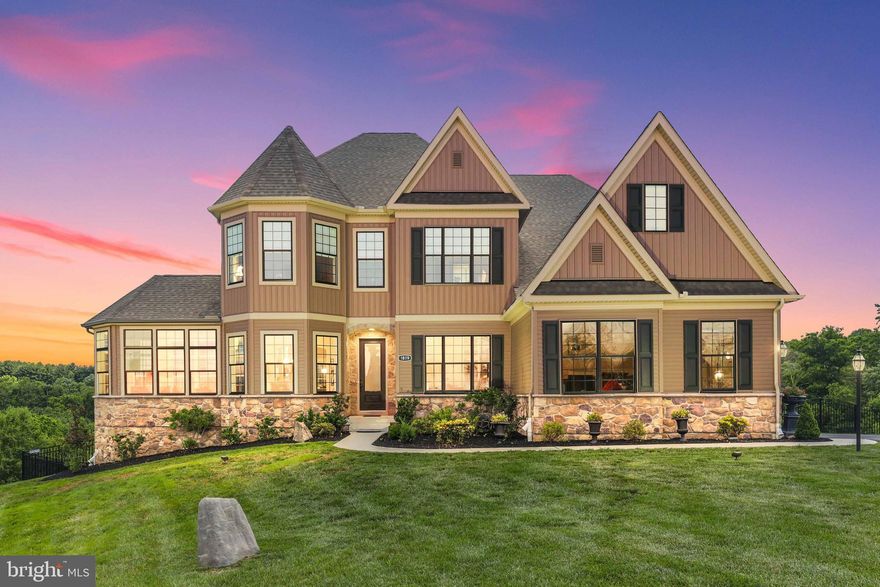 Regal, Refined, Luxurious. 4 Bedroom 4.5 Bath home with an extra-wide driveway and oversized attached 3-car garage with the capacity for electric car charger to be installed. Built in 2021 by Keystone Custom Homes. Nestled on a 1.07-acre lot in The Preserve at Marriotts Ridge which is located behind the Howard County Conservatory. The home features large windows that invite sunlight to dance across the 10 foot high ceilings and rich hardwood flooring throughout the main and upper levels. The main level was designed with the perfect balance of beauty and function. The Study is located just off the Foyer adorned with large windows, recessed lighting, and an arched entranceway; positioned apart from the Kitchen and Family Room allowing for privacy when working or studying from home. Envision your loved ones enjoying gatherings in your Formal Dining Room and adjoining Conservatory which feature elegant columns and arched doorways. The Kitchen is stunning with stainless steel appliances, TWO refrigerators, double wall ovens, gas cooktop, granite countertops, chic soft close white cabinets, and sophisticated lights above the spacious island. Enjoy a quiet meal in the mornings or a snack break in the comfort of the Breakfast Room which overlooks your idyllic rear yard. On cool evenings relax by the warmth of the fireplace in your stunning two-story Family Room. Relish in the majesty of the natural serenity which surrounds the property from the comfort of your Sunroom; enchanting sunsets, floating snowflakes, colorful birds, and fireflies glittering in the night. The open floor plan of the main level offers abundant space for entertaining and also to escape from the busy world to reconnect with nature and inner peace. The upper level of your home presents all the sleeping quarters and laundry. The Primary Bedroom is an oasis crafted for royalty, with TWO enormous walk-in closets and a spa-like Primary Bath. The astonishing Ensuite boasts a glamorous soaking tub, elegant oversized shower, crown molding, and two vanity sinks. The 3 additional Bedrooms of the home all contain walk-in closets. Laundry can be installed on all three levels of the home. The newly finished lower level features a spacious recreation room and stunningly renovated full bathroom with a dog washing station. Walk out to the patio and brand new deck overlooking the large private back yard, surrounded by trees. Your new exquisite home is located less than 15 minutes from Route 70, 695, and 95. Conveniently located within 22 miles of downtown Baltimore and 40 miles from Washington, D.C. Outdoor recreation is nearby: Centennial Park, Patapsco Valley State, Park Alberton Rocks, to name a few. Book your appointment today for the chance to call Davis Branch your own home sweet home.