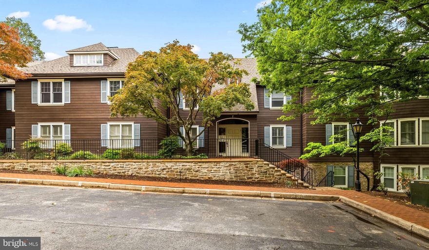New Price...Welcome to Devon Hill...a beautiful  historic 9 acre property filled with exquisite gardens and walking trails.  This ground level condo offers a gracious floor plan with 3 bedrooms, 2 baths.  The spacious living room has tons of natural light, a wall of built-ins and wood-burning fireplace with  French doors leading out to the brick terrace and lawn. The primary bedroom has an attached bath with sunken tub & separate shower and access out to the patio.  The 2nd bedroom has a walk in closet and fireplace. 3rd  bedroom is en suite.  Also included is an additional large storage closet and  dedicated covered parking space. The seller was an original owner and used the gazebo and formal gardens designed by the Olmsted brothers, for entertaining.  Pet friendly community.  Walking distance to Lake Roland, Corner Pantry and Pepe's!