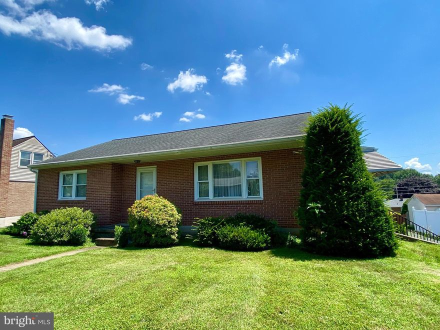 Welcome to 918 Laurelee Avenue, a charming and solidly built home in the  Muhlenberg School District. This three bedroom,  two full-bath ranch offers tremendous potential and great bones throughout. Step inside to find a spacious living room filled with natural light. The current carpeting may be dated, but hardwood floors lie beneath, just waiting to be uncovered. A classic pink bathroom adds a nostalgic touch—and room for a modern refresh. The eat-in kitchen is functional and filled with opportunity to make it your own. All three bedrooms offer generous space and ample closet storage. Downstairs, a full basement provides room for storage, hobbies, or future living space. Attached 1-car garage adds everyday convenience. Step outside to a truly lovely yard—flat, usable, and ideal for relaxing or entertaining. This property is perfect for buyers ready to add their personal touch & easy access to schools, shopping, and major routes. Solid construction, great yard, and a price point that leaves room for updates. Homes with this kind of character don’t last long. Schedule your private showing today!