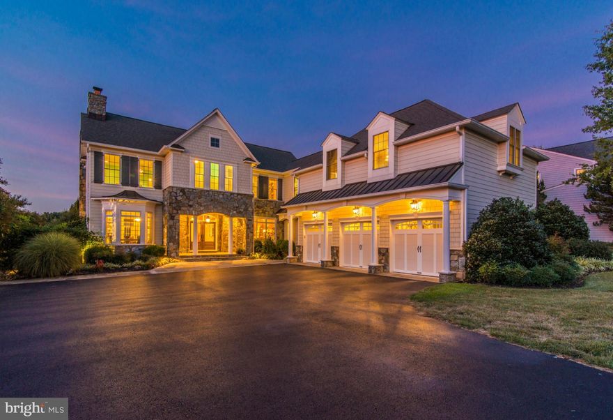 Exquisite luxury with  unmatched views of Cattail Creek CC at the end of a private cul-de-sac .  Top of the line everywhere- Gourmet kitchen w/ pro grade appliances, upgraded granite, and full 1st floor walnut flooring.  LL media, office, and game room w/ full bar.  Every br has its own fb, including the over garage guest suite w/ living area.  Too many options to list, this is a true 10+!