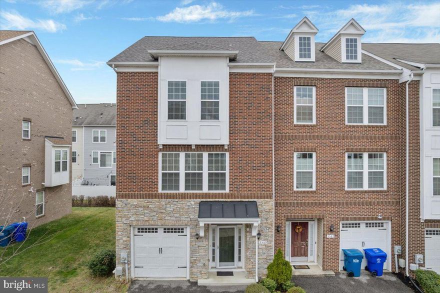 Beautiful 3- Story Colonial End Unit Townhome. This spacious and well-maintained townhome offers 3/ bedrooms, 3.5 Bathrooms, and a one-car garage. The main level features crown molding, 42" cabinets, granite countertops, stainless steel appliances, hardwood floors, recessed lights, and a cozy gas fireplace,  an open concept kitchen/ Living room with a kitchen island and breakfast bar perfect for entertaining. Upper Level offers primary bedroom includes a walk-in closet, a separate shower, and a luxury soaking tub. Along with two spacious secondary bedrooms. Laundry room is on upper bedroom level. The fully finished basement features a full bath and, walkout access to a private fenced-in yard ideal for relaxing or hosting guests. Conveniently located near schools, shopping, and major Commuter routes. NEW ROOF INSTALLED IN 2024