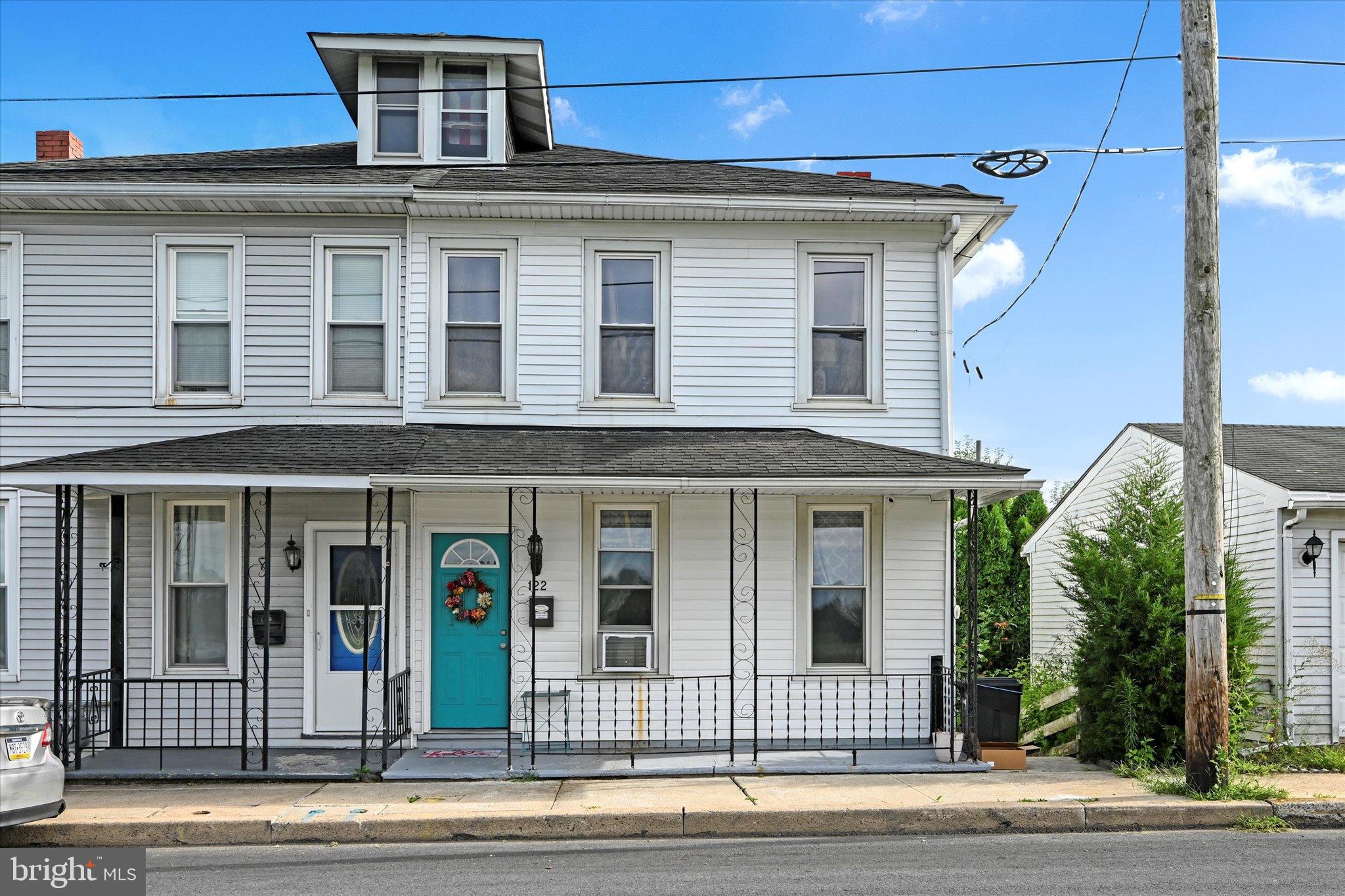 This charming 3-bedroom, 1-bathroom end-of-row townhouse, built in 1940, offers a blend of traditional style and modern convenience. The home features a well-equipped kitchen with a built-in microwave and gas oven/range, perfect for culinary enthusiasts. Enjoy the spacious 1,290 sq ft layout, complemented by a walkout basement that provides potential for additional living space or storage. The property boasts a low-maintenance exterior with durable vinyl siding and a cozy lot size of 0.06 acres. Parking is hassle-free with off-street options available. Inside, you'll find a mix of carpet, laminate plank, and vinyl flooring, ensuring comfort and practicality throughout. Located in a peaceful area, this home is ideal for those seeking a blend of classic charm and modern amenities. Don't miss the opportunity to make this property your own!