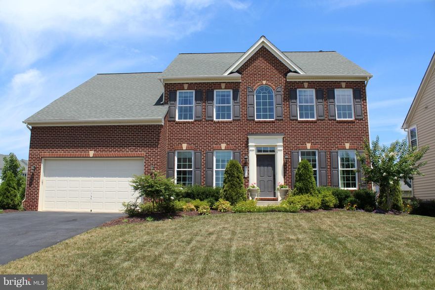 Beautiful NV brick front stunner--walk to Urbana Regional Park, amenities & shopping! Upgraded fixtures, lighting, hardwoods, moldings. Large 1st fl. office.  Spacious gourmet kitchen w/granite. 4 large upper bedrms. Master w/walk-in closets, spa bath. Enjoy entertaining in the fantastic finished basement w/wet bar, rec area, bonus rm and luxe full bath! Prof. landscaped lot, fenced yard & deck