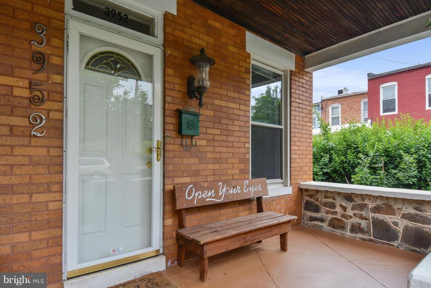 Bright and open end of group town home on a great street in Hampden. Mouldings, French doors and other details throughout. Brand new top of the line chef's kitchen. Granite, Stainless, new cabinets, bar area. Fully fenced back yard doubles as a large parking pad. Deck off of kitchen. Walking distance to the Avenue in Hampden.