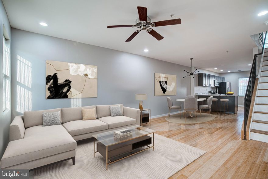 Soaring spacious 3-story, 3-bedroom, 3.5 bath home with laundry in the basement, large rear yard, and a deck located in the Fishtown/East Kensington neighborhood.  New Construction home built in 2012. This beautiful brick-front home has hardwood floors throughout, recessed lighting, ceiling fans, central air, and forced hot air heat.  The entire home is flooded with natural light and all of the rooms are spacious with plenty of storage. Enter into an open-concept 1st-floor layout with plenty of room for living room and dining room furniture plus a convenient 1/2 bath. The kitchen is located in the rear with access to a large cemented fenced-in yard. The kitchen is beautifully paired with solid wood cabinets, granite counters, and a peninsula breakfast bar with seating. All appliances are included. The 2nd floor has 2 large bedrooms and 2 full baths. The third floor has the largest bedroom suite with access to the walk-out deck. The basement is expansive with laundry included and plenty of space for all of your storage needs. This home is walkable, bikeable, and close to local restaurants and cafes, shopping, and social venues.