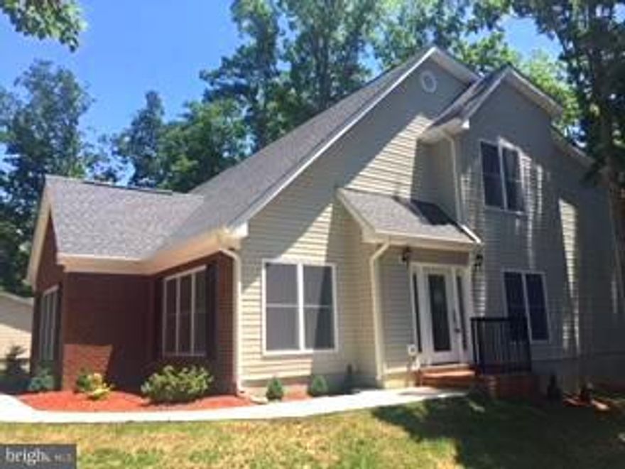 MOTIVATED SELLER!   Two master suites, light-filled living and family rooms, luxurious bathrooms, fireplace and deck. Large, level back-yard close to pool & community center.