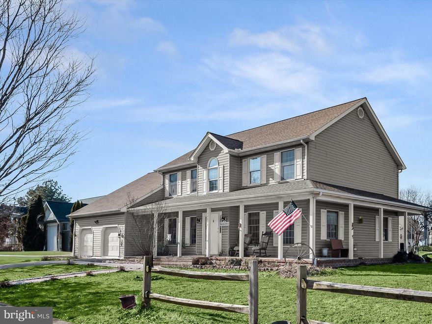 This charming Colonial home with a wraparound porch offers abundant space with 5 bedrooms and 3 full baths, making it ideal for both relaxing and entertaining. Recent updates, including a new roof installed just six months ago, luxury vinyl plank flooring, updated light fixtures, and more, enhance the home’s appeal. A welcoming two-story foyer invites you in with natural light streaming through the Palladian window and sidelights. To the left and right of the foyer, you'll find spacious formal living and dining rooms. The dining room is highlighted by an elegant Tiffany light fixture, while the living room showcases gleaming hardwood flooring, creating a sophisticated atmosphere.
The kitchen features white cabinetry, a beautiful new backsplash, and high-quality stainless steel appliances, including a gas range. With a pantry and breakfast table space, this kitchen is both functional and stylish. A sliding glass door leads from the breakfast area to the patio, allowing easy access to outdoor living. Luxury vinyl plank flooring ties the space together, offering both durability and charm. A versatile main-level bedroom with an attached full bath provides flexibility for a guest room, home office, or other use. The attached bath is complete with a curbless shower featuring no threshold, ideal for easy access. The main level is finished off with a laundry room, where the washer and dryer were replaced about a year ago, along with a newly installed vent system.
Upstairs, the primary bedroom offers a spacious retreat with a walk-in closet and an en-suite bath. Three additional bedrooms and a full bath offers plenty of space for family or guests on the upper level Situated on nearly a quarter-acre corner lot, this home is surrounded by expansive back and side yards, providing plenty of room for play, gardening, or outdoor gatherings. The backyard features a paver patio with a fire pit, perfect for cool evenings and making memories with family and friends, while a peaceful pond feature creates a serene atmosphere.
The front yard includes a well-maintained paver sidewalk, welcoming you to the home, and there’s a practical paver pad for trash cans on the side of the house. Beautiful trees add both beauty and bounty to the outdoor space, with a cherry tree, crepe myrtle, two fig trees, and an apricot tree all adding to the home’s charm.
Conveniently located near local amenities, 29742 Austin Lane offers easy access to outdoor activities such as Idlewild Park, as well as Pickering Creek Audubon Center. For shopping, Queenstown Premium Outlets are 20 miles away, offering brand-name discounts, while Easton Village Shopping Center, with its selection of local boutiques, art galleries, and antique shops, provides a unique shopping experience. This home is ideally situated to enjoy the best of both indoor and outdoor living, offering an exceptional lifestyle in the heart of Easton.