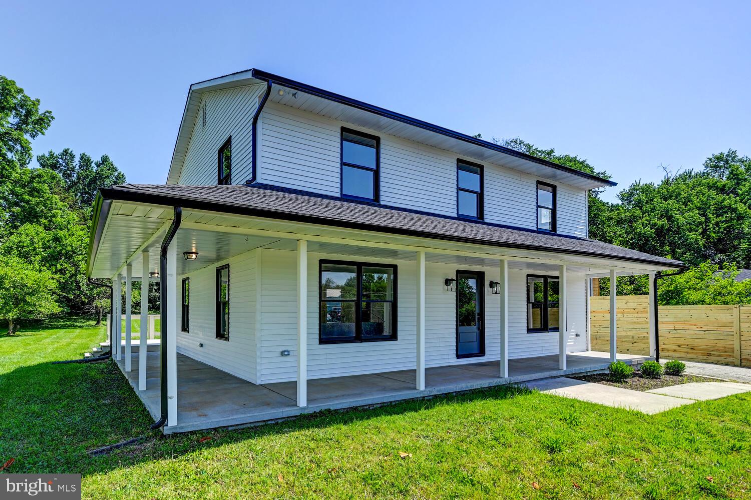 Welcome home to where classic charm meets modern sophistication. This beautifully reimagined farmhouse has rediscovered its soul—with light, neutral tones flowing throughout, it radiates warmth, elegance, and effortless style. Step onto the inviting front porch and into a space that feels both timeless and fresh. The heart of the home is a show-stopping kitchen featuring a generous island and a sunlit breakfast nook, all overlooking an expansive rear deck and a lush, level backyard—perfect for morning coffee or evening gatherings under the stars. Entertain with ease in the formal dining room just off the kitchen, made for hosting everything from intimate dinners to festive celebrations. With four spacious bedrooms and three full baths, there’s room for everyone to live, work, and play in comfort. Retreat to the luxurious primary suite, where a spa-like bathroom and a walk-in closet create your own private sanctuary. Downstairs, the partially finished lower level with full bathroom and storage room offers endless possibilities—think media lounge, stylish home office, guest living space or the ultimate game room. This is more than reimagined—it’s a revival. Style, space, and soul await.