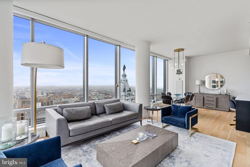 Northwest corner. Unobstructed views. The most sought after two bedroom layout at The Ritz-Carlton Residences Philadelphia.

Residence 44F rises high above Philadelphia on the 44th floor, offering sweeping views that clear surrounding buildings and capture Philadelphia City Hall, William Penn, and dramatic western sunsets. Floor to ceiling windows wrap the home, bringing in exceptional light from every angle and creating a true sense of openness and scale.

The interior has been thoughtfully upgraded with new wide plank flooring and a clean modern aesthetic that elevates the entire residence. The kitchen is designed for both everyday living and entertaining, featuring top tier appliances, updated countertops, and a full slab backsplash.

The primary suite offers a quiet retreat with a spa quality bath finished in Calacatta marble, complete with a Bain Ultra soaking tub and glass enclosed shower. A spacious second bedroom provides flexibility for guests, office, or additional living space.

Ownership includes access to over 10,000 square feet of amenities and services, including 24 hour concierge and doorman, valet parking, chauffeur driven house car, fitness center, indoor pool, resident lounge, and landscaped garden. The newly reimagined outdoor terrace is a true extension of the home, featuring full outdoor kitchens, multiple grilling stations, three fire pits, expansive dining areas, and multiple outdoor living rooms, all set against iconic views of City Hall. A newly added outdoor dog park provides convenience and a dedicated space for pets.

This is elevated city living defined by light, views, and full service convenience.