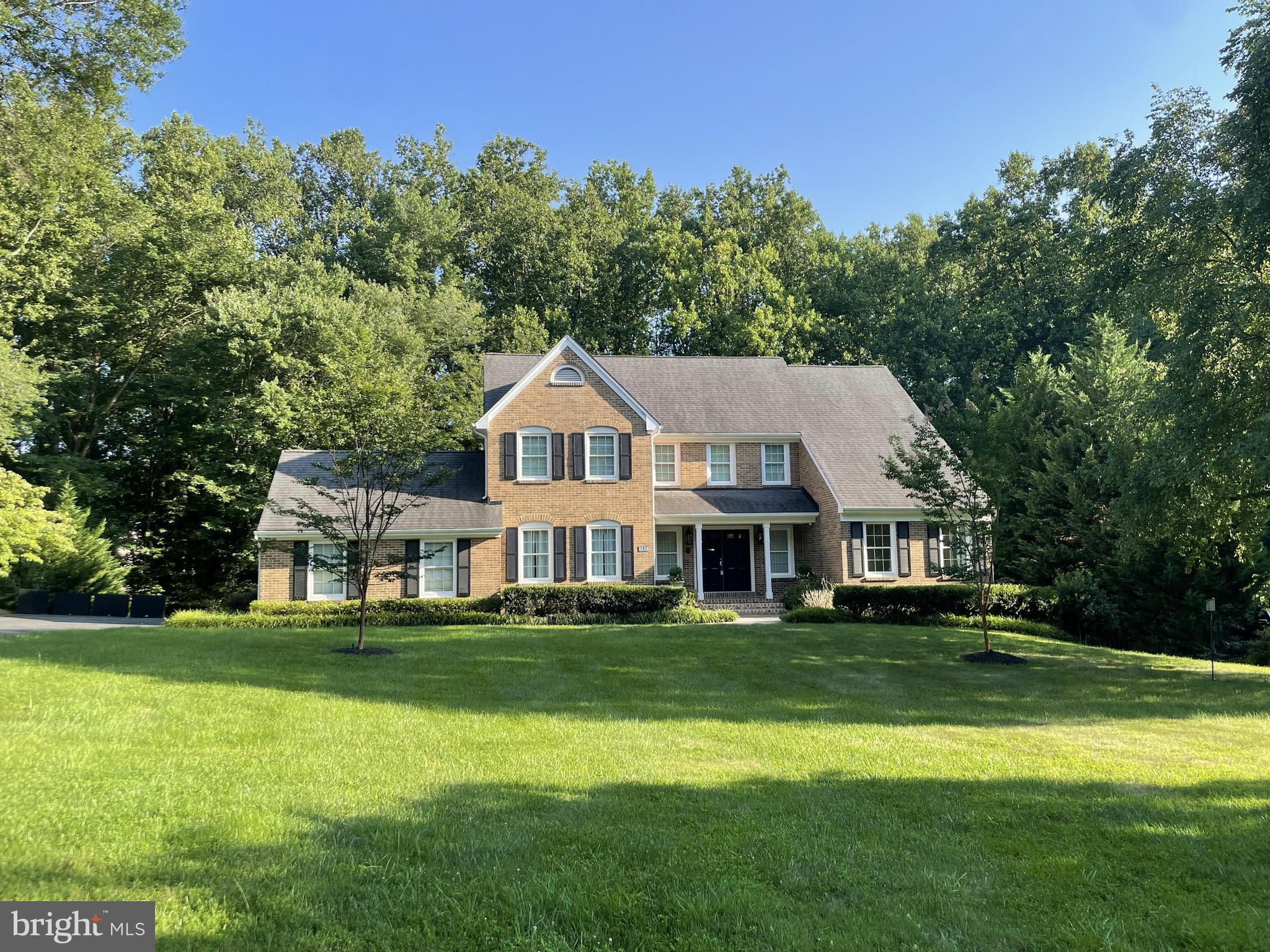 Rare opportunity! Stately, fully renovated colonial inside the beltway in coveted Langley HS pyramid -- minutes to downtown DC, major airports, and all key highways and toll roads. Privately nestled on a quiet cul-de-sac with a deep yard & neighborhood access to acres of parkland with miles of trails.
A grand foyer welcomes you into expansive living spaces with hardwood floors on the main and upper levels. New, high-end chef's kitchen features elegant cabinets, quartz counters, designer hood, island, eat-in area with abundant windows, and stainless steel appliances including induction range and built-in microwave.
Step down family room off the kitchen boasts wood burning fireplace flanked by french doors to large deck overlooking private yard and woods. Formal dining room features beautiful mouldings and views of the expansive front lawn. Spacious step down living room drenched in sunlight. A large main level office showcases a wall of built-ins & french doors to rear deck.
Upper level features a grand primary suite with cathedral ceilings, 2 walk-in closets, a dressing area, and enormous luxurious bathroom with soaking tub, frameless glass shower, double-sink vanity, and skylights. Three additional spacious bedrooms are serviced by an updated hall bath.
The light-filled walkout lower level includes oversized rec room, a fifth bedroom and full bath (perfect au-pair or in-law suite), second office/exercise studio, abundant storage, and french doors to private yard.
Meticulously maintained and exquisitely renovated home in highly sought after neighborhood with unbeatable location & quick access to nature, top schools, and downtown DC!