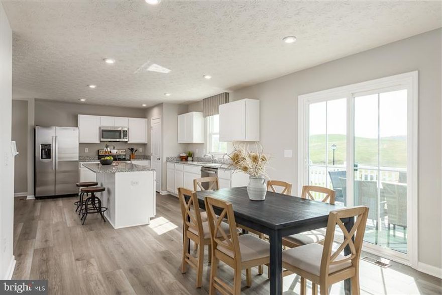 ELDER TO BE BUILT APRIL DELIVERY!
This Elder has it all. Step inside this 2-car garage single-family home, where a sprawling great room adjoins a gourmet kitchen with a large island with granite countertop that overlooks the dining area. A versatile flex room is ideal for a home office, hobby area or play space. Upstairs, two bedrooms each feature a walk-in closet and share a hall bath with a third bedroom. Inside your owner’s suite, you’ll find a luxurious dual-vanity bath and two walk-in closets. The walk-in laundry room comes with a full sized washer and dryer. 
Entertain family and guests in the 2nd floor open loft. The unfinished basement includes a 3-piece rough- in for a full bathroom.  The Elder will be enjoyable on all levels!

***Builder Cash Discount that's tied to in-house lender***
**over $25K in savings**