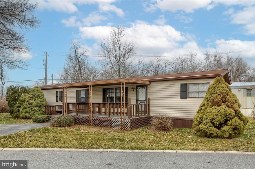 1985 Redman. 2 Bedroom 1 Bath. Kitchen opens to Living room with Vaulted ceilings. Unique double sink in bathroom.  Primary Bedroom has double closets and lots of built in drawers. Bedrooms and Kitchen newly painted. Enjoy the covered front porch, and new shed for extra storage. Parking for 2 cars in driveway. Leak at Kitchen and Bathroom sink to be fixed prior to settlement. Furnace cover to also be replaced prior to settlement. Lot Rent includes Sewer & Trash.