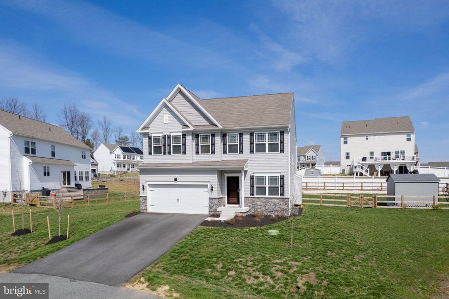 THIS 4 BR 2/1 BA, LIKE NEW COLONIAL ON FENCED CUL DE SAC LOT IS A GREAT PLACE TO CALL HOME! Only available because of owners transfer.  Built in 2024, this residence boasts a perfect blend of modern elegance and traditional warmth, making it ideal for those seeking comfort and style. The heart of the home is the combination kitchen and dining area with tons of natural light. Kitchen showcases granite countertops, stainless steel appliances, an island for casual meals, table space, and a pantry for all your culinary needs. The family room, conveniently located off the kitchen, is perfect for gatherings, enhanced by a cozy gas fireplace that adds a touch of warmth on chilly evenings. Primary suite with en suite bath and walk in closet,  All Bedrooms are great sizes and all offer ceiling fans. The upper-level laundry adds convenience to your daily routine. Outside, the property shines with a beautiful paver patio and BBQ space,  exterior lighting, 10x12 shed for storage, and fully fenced backyard .  Owners are nurturing the lawn (see photos green not photoshopped) and added drainage diversion system to enhance the outdoor enjoyment.  The attached two-car garage and driveway offer plenty of parking space for you and your guests. Full basement ready for your personal touch has rough-in for future bath and wide  walk up exit to back yard., This home is designed to meet all your needs. Experience the perfect blend of comfort, style, and functionality in this exceptional property.