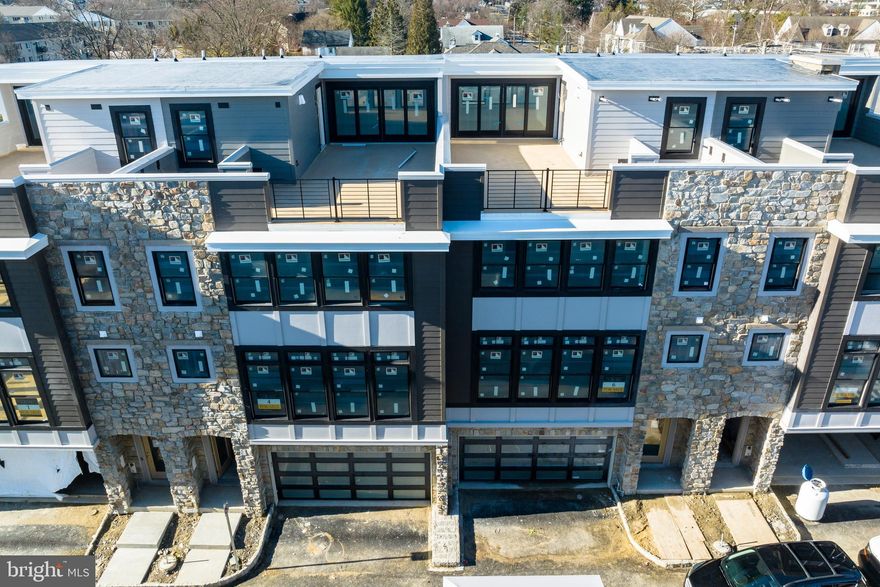$20,000  SAVINGS INCENTIVE *!  Rare opportunity to custom build in Devon! NEW construction in TE Schools with 4 stop elevators by Rockwell Custom! This is the luxury end townhome you have been waiting for.  Enjoy large rooms, upscale finishes and all the space you need with 3-5 bedrooms. You decide how you want to live. Extra rooms for you to use how you need - home office (1 or 2?), exercise room, studio, home gym, rec room. 2 car garage can be found on your entry level along with an extra bonus room with full bath. The main level flaunts extra tall ceilings, oversized black windows, a spacious open great room, a modern gas fireplace with optional built-ins. Design the kitchen of your dreams with a 12' island, pantry, double ovens, micro-drawer and additional serving bar. Your primary bedroom is a true escape with a very large custom outfitted walk-in closet and an owner's bath that can be precisely designed to suit your needs.  Laundry can be found on this level along with 2 additional bedrooms. Take the elevator up to the 4th floor bonus room and 400 sq ft rooftop terrace overlooking the main line.  Enjoy yet another fireplace or add a built-in grilling station to your luxury rooftop escape in the sky. Whether entertaining, sun-bathing, or stargazing; this space is a crowd pleaser! This home has it all in the area you know and love - walk to the Main Line's favorite places, just minutes from Route 30 shopping and dining. Only 7 homes will be available at Berkley.   This home is 1 of just 2 end homes with this floorplan that is customizable.   Don't wait, add  your personal touch at our Rockwell Custom Design Studio.  Now is your chance to build the home you deserve. *incentives valid with cash purchase or use of preferred lender   Photos for  marketing purposes
