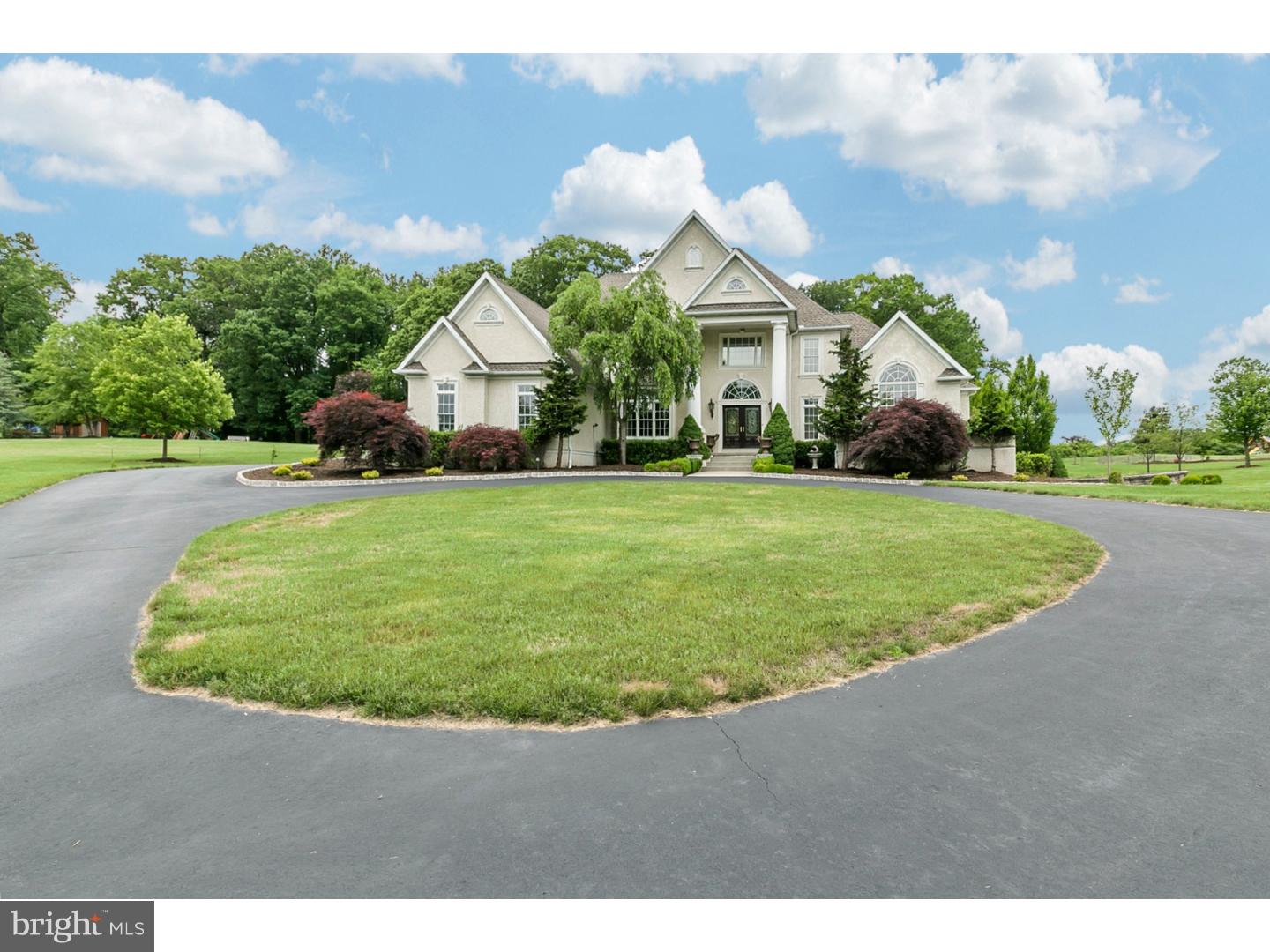 Stunning custom-built home welcomes you from its circular driveway with magnificent custom fluted columns leading into a curved staircase entry. Situated in a secluded neighborhood amidst the beauty Of Berks County with spectacular views in all directions. Property features a first floor large master suite( with direct access to in ground pool and hot tub) his and hers showers, oversized jetted tub.  The chef's kitchen will delight with custom cherry cabinetry, Wolf Dual Fuel Range, Wolf Warming Drawer, Sub Zero refrigerator, Sub Zero Wine Refrigerator, Two Asko Dishwashers, Two Franke Sinks, butlers pantry, appliance closet, morning room -WOW! The adjoining 2-story family room with floor to ceiling fireplace is flooded with natural light coming through the wall of windows. From the sunken living room with two story coffered ceiling and gas fireplace one can enjoy views of the professionally landscaped grounds and award winning pool. The upper level boasts a loft area and three large bedrooms with walk in closets and private baths. State of the Art amenities include a dual closed loop geothermal heating and cooling, fully wired for electronics, alarm system, high performance central vac, large laundry with dual washers and dryers, Two water heaters, two storage tanks, and Home run plumbing assure rapid hot water located by natural beauty; it is adjacent to the Blackwood Golf Course with 130 acres of pristine tree lined fairways, and just minutes from French Creek State Park, 'an oasis for people and wildlife.'