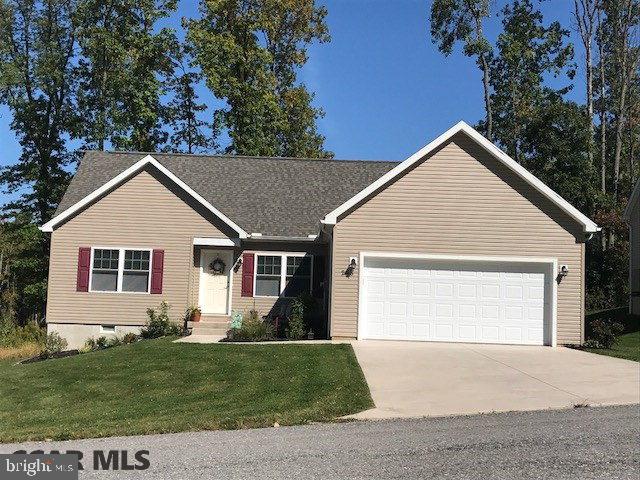 Located in the State College School District, this beautiful home shows like a model home! Wonderful open floor plan with extra large island in the cheerful kitchen. Lovely crown molding appoints most rooms. First floor master suite boasts a large walk-in closet. Spa like bath with soaking tub, double vanity and seated shower. Great potential if you're looking to add a rec room or additional bedroom and bath in the unfinished attic since the plumbing is already roughed in! This owner expanded the deck in the back yard to enjoy summer barbecues and accommodate more guests. This home is perfect for someone looking for one floor living or a second home for PSU events since it's just minutes from campus.