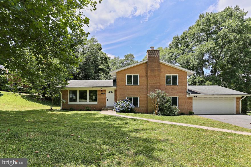 13324 Sherwood Forest Drive awaits its next owner! This home has many appealing attributes: ample front and back yard space (.60 acres), oversized 2 car garage (21x29), 4 sizable bedrooms and so much more! As you step inside, the foyer gives access to either side of the home with the living room to the left and the family room to the right. The living room connects to the dining room with hardwood flooring running through the two rooms. A sliding glass door leads you from the dining room to the back patio and spacious back yard. The kitchen has a window overlooking the back yard as well as another door to exit the home. Additional seating can be accommodated with another table in the kitchen. Travel up 7 steps to the 4 bedrooms and 2 full bathrooms. Hardwood flooring throughout the upper level. The primary bedroom features 2 closets and an en suite bathroom. Travel down a few stairs to the large family room with a brick accent wall and wood burning fireplace. The laundry room and access to the expansive garage is on this level too. The garage is great for parking, storing outdoor equipment and still spacious enough for a workshop. Just a few minutes from shopping, dining and entertainment! Commute friendly - close proximity to New Hampshire Ave, Route 200 and Glenmont Metro Station. One year Cinch Home Warranty included for the Buyer! Book your showing today!