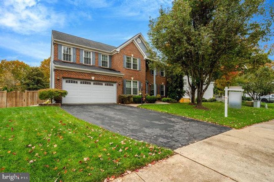 Welcome to 10073 Loblolly Trail, a beautifully refreshed colonial that perfectly blends classic charm with modern living in the sought-after Great Oak community of Manassas. Designed for everyday comfort and effortless entertaining, the main level offers open, sun-filled spaces with hardwood floors, fresh paint, and a beautifully updated kitchen with granite counters, stainless steel appliances, and a seamless connection to the family room and deck. Upstairs, the primary suite feels like a private retreat with vaulted ceilings, dual walk-in closets, and a spa-inspired bath featuring a frameless glass shower and soaking tub. The walk-out lower level adds even more flexibility with a spacious rec room, full bath, and bonus room for guests, fitness, or a home office. Thoughtful updates include brand-new siding (2024), new fence (2023), renovated bathrooms, and upgraded systems. Move-in ready, stylish, and ideally located near shopping, dining, and commuter routes, this home truly has it all.