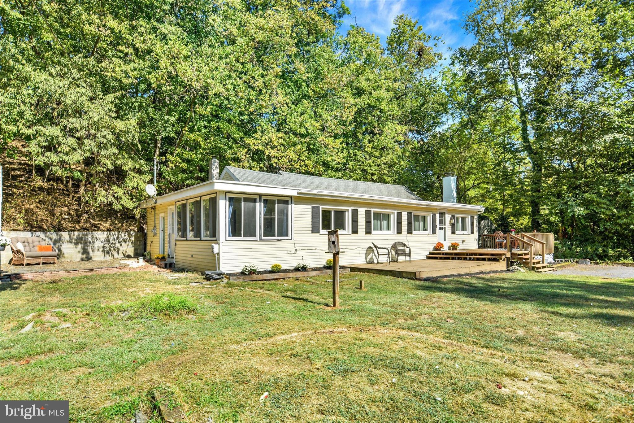 Nestled in the desirable Cumberland Valley School District, this beautifully maintained 2-bedroom, 1-bath ranch home offers serene creek frontage and peaceful surroundings. The property includes a detached garage with a fully finished studio apartment above—perfect for guests, a home office, or rental income. Enjoy one-floor living in great condition, with scenic views and a unique blend of comfort and versatility. A rare find in a sought-after location! A joy to own