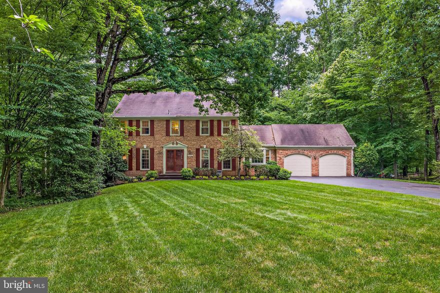 Welcome to this charming 4,000 sq ft colonial, nestled on almost half an acre on one of the most sought after streets in the highly desired Fairfax Station neighborhood.  You are greeted by a lush, flat front yard bordered with mature trees🌳.  A 2 car front load garage awaits, while a walkway leads you to the impressive double entry front door.  Inside, warm hardwoods greet you in the open foyer and meander throughout the main level, where formal living and dining rooms flank the center hall.  A bonus den/office/potential main level bedroom is neatly tucked away and is situated next to the oversized powder room on the main level.  A renovated gourmet kitchen with top of the line stainless steel appliances, quartz countertops and tons of cabinetry is the heart of the home and has plenty of space for preparation and entertaining.  An informal dining area adjoins the cozy family room where the focal point is the brick surround gas fireplace.  It is also here that you are granted access to the expansive deck beyond.  A coat closet and laundry room complete the main level.  
Upstairs you will find the primary suite with its own sitting room and plenty of closet space.  The renovated ensuite is as beautiful as it is functional, and is the perfect place to start and end your days with 2 vanities, a soaking tub, separate walk in shower and a walk in closet.
Down the hall, 3 additional bright and cheerful bedrooms, each with generous closet space share the beautifully appointed hallway bathroom complete with a new vanity, mirrors and lights.
The lower level of this home has walk-out access to the backyard and a wood burning fireplace.
Every inch of this home has been lovingly maintained and updated! Welcome home! 
🎓Oak View Elementary School and Robinson middle and High School pyramid. 
Windows - 2014, Hot water heater - 2025, Septic pumped 11/25, Carpet - 2026, paint - 2026.
🏊‍♂️Community pool (memberships available), 🎾tennis courts, neighborhood pond, and walking trails. Easy access to the Fairfax County Parkway, Route 123/Ox Road, commuter bus stop at entrance to the neighborhood, Burke Center VRE station minutes away.