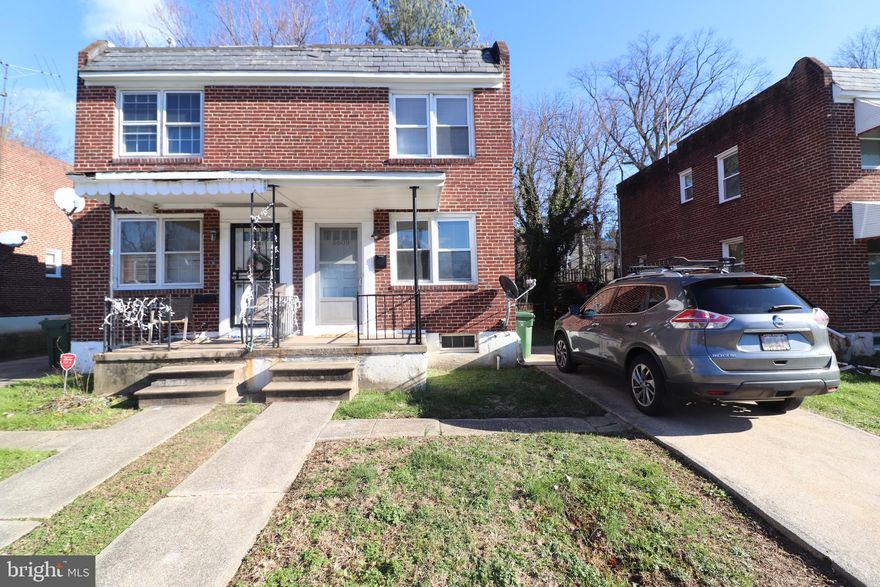 Great 2 Bed Rental in Hamilton! A mile from Harford Road, Close to University, Hardwood Floors, Lower Level Family Room, Laundry, Back Yard! Owner requires 650 minimum credit score.