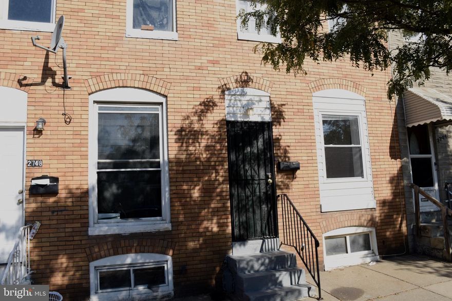 Come tour this updated row home in Charm City! This home features 2 bedrooms and one large bathroom with tub/shower combo.  Main level features open concept with updated features in kitchen. Enjoy a back porch with fencing all the way around for full privacy! Washer/Dryer Combo on main level. Basement is partially finished with room for storage and entertainment. Hardwood floors through out home with exposed brick on upper and main level!