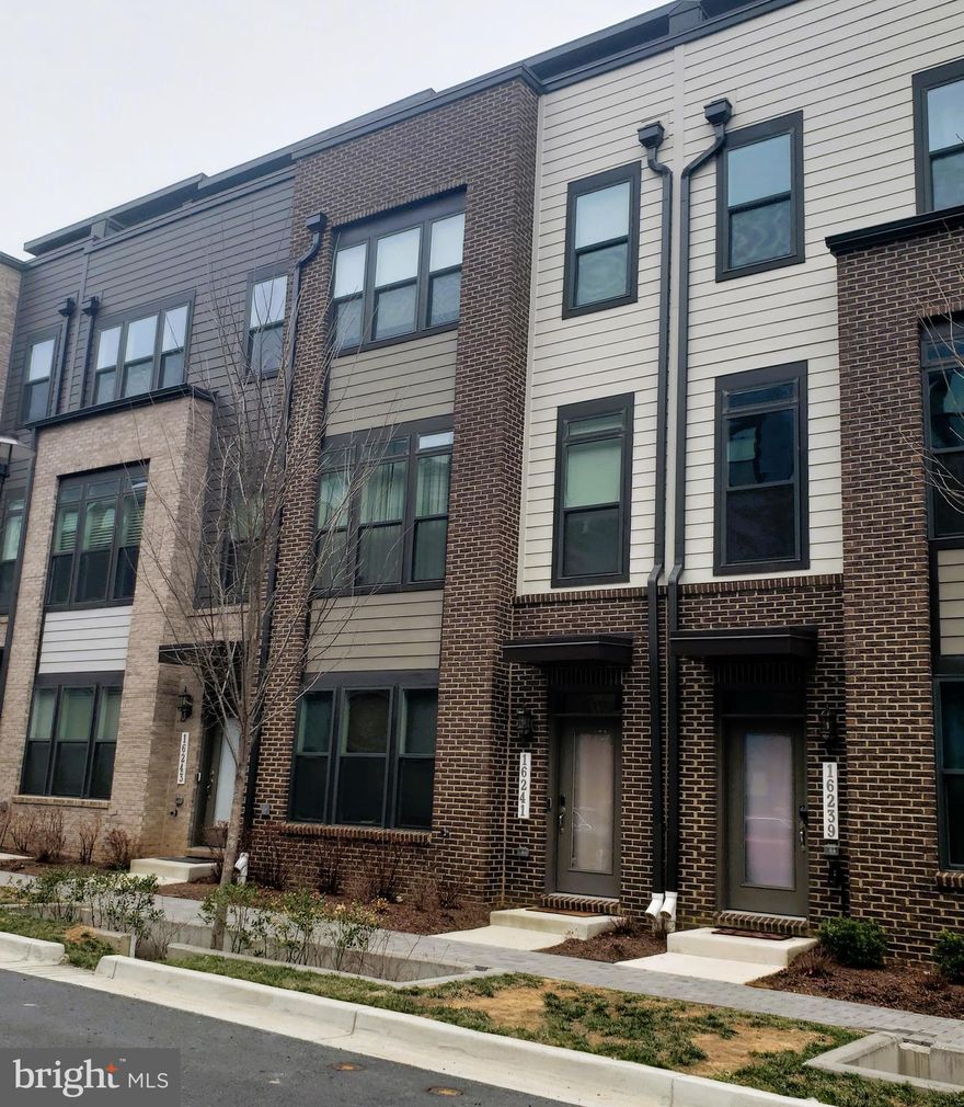 Luxury TH now available in sought after community of Westside at Shady Grove. This spacious home is so welcoming!
You'll love living in this bright and airy living environment filled with ample natural light. The first level features an open-concept layout with a living room, kitchen, and dining area.
The kitchen features a large kitchen Island with storage and sink, stainless steel appliances, and custom cabinetry. There is balcony off the dining area, perfect for sipping morning coffee. Upstairs, you'll find two generously sized bedrooms and two full bathrooms. The top floor has a private suite, living area and roof top deck - perfect for entertaining!
The attached garage offers convenience and extra storage space.  In addition, the garage has epoxy flooring which is durable, stain resistant and easy to clean.
Community amenities including a community center, swimming pool, and dog walking area. This prime location provides easy access to major routes such as ICC-200, I-270 and I-495.
Within minutes to the Shady Grove Metro Station, ensuring easy access to downtown Washington, D.C. and beyond. Contact us today and see what Westside at Shady Grove has to offer!