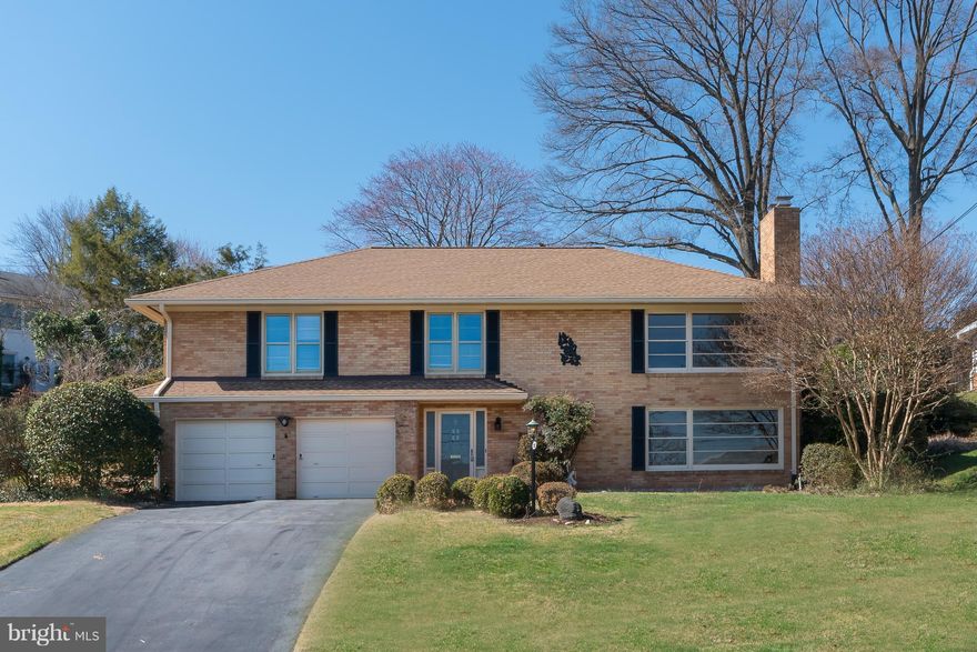 Spacious sun filled Bi-Level SF home in popular Villamay. Fabulous, newly renovated kitchen opens to LR & DR. Enjoy winter views of the Potomac! Hardwoods throughout, freshly painted exterior and interior, two fireplaces, sunroom off kitchen, brick patio, 4 BRs, 3 full baths, 2 car garage, storage room and walk up attic. Just minutes from Old Town and GW Parkway. Owner will consider a pet.