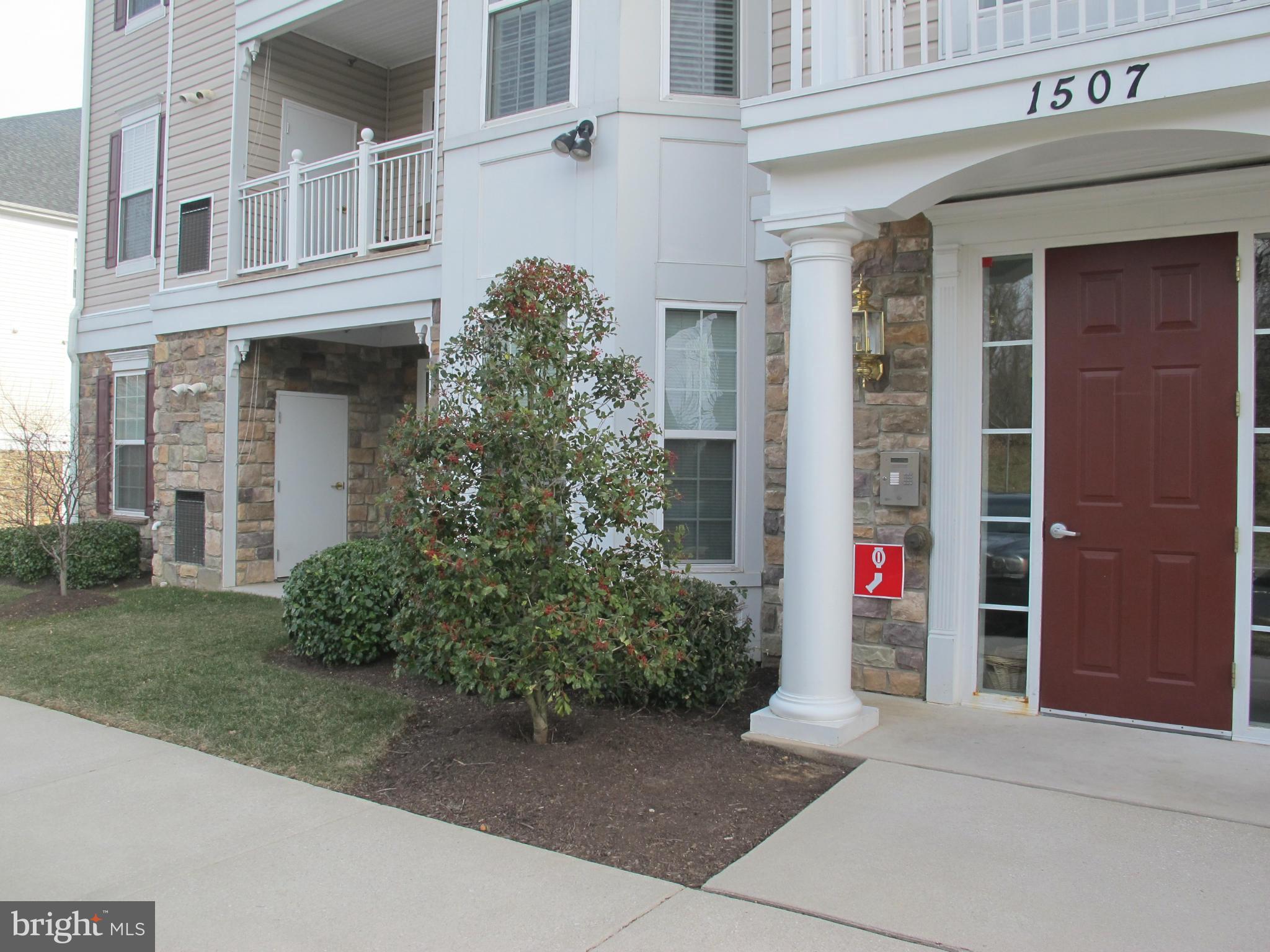 55+ Community! Gorgeous, sun-filled and airy first floor unit. Nine-foot ceilings, crown molding, open floor plan, breakfast bar seating, corian counters, 42" cabinets and large pantry. Gleaming wood floors in kitchen, entry and breakfast room. Corner unit with bay window to fill home with natural light. Main level unit with no stairs and bonus patio entry. Not FHA approved.