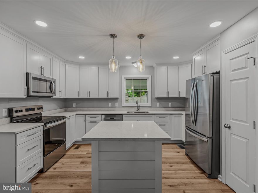 Absolutely gorgeous 4-bedroom, 2.5-bathroom home with approximately 4000 total finished square feet.  Located in Shepherdstown WV, and just minutes from Shepherd University, this home has been completely re-done and features a NEW ROOF, new gutters and downspouts, two new HVACS, two brand new hot water heaters, new siding, fresh paint, new hardware and fixtures, all new windows, 2 and a half-remodeled bathrooms, and new LVP flooring throughout. The kitchen has been upgraded with new cabinets, new stainless-steel appliances, and new granite counter tops. There are two family rooms, one of which is massive and can be used as a rec room/ bonus room. Other features include a two-car garage, a front porch, and a rear screened in porch. Don't miss out on this!!!