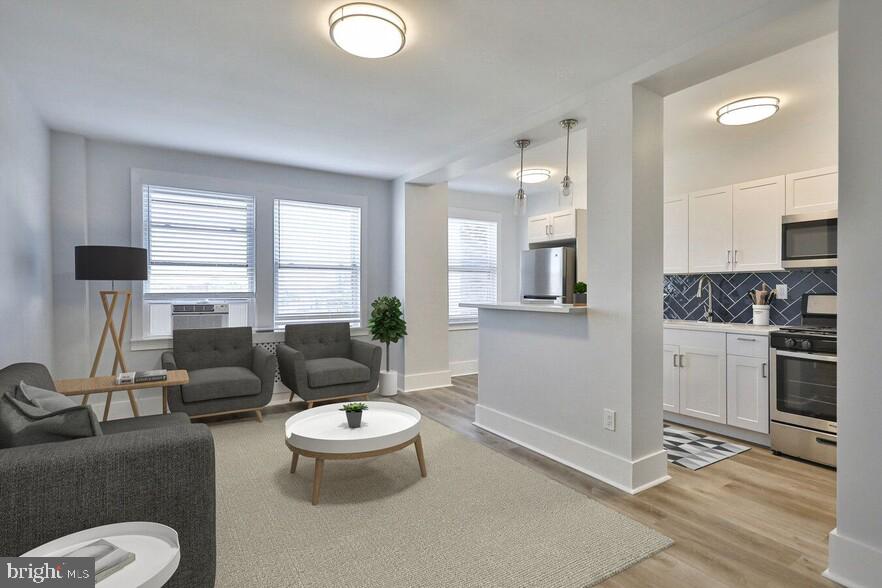 Fairfax Apartments, located at 4247 Locust Street in Philadelphia, PA 19104, offers a unique blend of modern convenience and classic charm, making it an ideal place to call home. This 10-story high-rise features a variety of floor plans, ranging from cozy studios to spacious two-bedroom units, with rents starting at $1,225 and going up to $2,795 per month. Each unit is thoughtfully designed with features such as hardwood floors, stainless steel appliances, walk-in closets, and large bedrooms. Some units also boast modern open floor plans, while others retain a vintage appeal with character-rich details.
Residents will love the array of amenities designed to enhance their living experience. The building includes a 24-hour on-site laundry room, a newly renovated bike room, and optional parking. For pet lovers, Fairfax Apartments is a pet-friendly community complete with a dog park and pet spa. The property also offers a fitness center, business center, and a gated entry for added security. Unique features like a Wi-Fi lounge, fire pit, and professional landscaping add to the appeal, ensuring that residents have everything they need right at their fingertips.
The neighborhood of Spruce Hill, where Fairfax Apartments is situated, is renowned for its urban appeal and diversity. This vibrant area is just minutes away from the University of Pennsylvania and Drexel University, making it an excellent choice for students and professionals alike. The community is well-served by public transportation, with a high walk score of 96 and a transit score of 87, ensuring easy access to all that Philadelphia has to offer.
Spruce Hill is characterized by its tree-lined streets, quaint shops, and a variety of dining options, including ethnic eateries and cozy coffee shops. Residents can enjoy free movies, orchestra concerts, and Shakespeare shows in the nearby Historical Clark Park. The area is also patrolled by Philadelphia police, University City security, and UPenn police, providing a safe and secure environment.
Fairfax Apartments is not just a place to live, but a community where residents can thrive. With its combination of modern amenities, classic charm, and a prime location in one of Philadelphia's most desirable neighborhoods, Fairfax Apartments offers an unparalleled living experience. Whether you're looking for a quiet retreat after a busy day or a vibrant community to engage with, Fairfax Apartments has something for everyone. Schedule your tour today and discover why future residents will love calling Fairfax Apartments home.
** Pricing and availability subject to change on a daily basis ** Photos are of model units ** Parking may be available for additional fee **