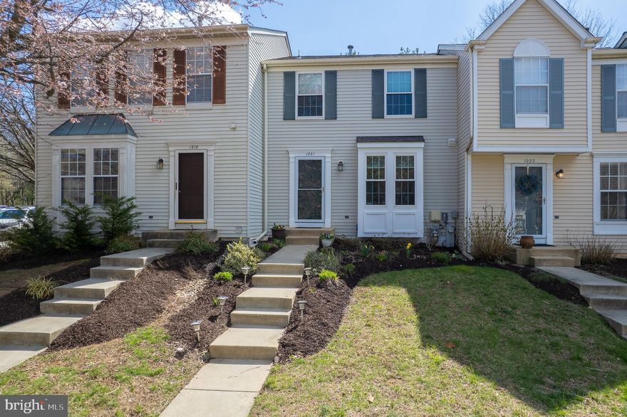 Just listed! Lovingly cared for and move-in ready townhome with 3 finished levels and new contemporary composite decking overlooking a serene setting. Updated kitchen with granite countertops, stainless steel appliances, and a bright box bay window with optional island seating. A spacious family room/dining area off the kitchen walks out to the deck—perfect for relaxing or entertaining. Two large upper-level bedrooms, including a renovated owner’s suite and a second ensuite with bath access. Lower level offers a versatile rec room or third bedroom with half bath. Located in Bay Hills HOA—buyers may apply for pool and/or golf membership—and in the sought-after Broadneck Blue Ribbon school district. Close to shopping, restaurants, and great walking/biking paths—perfect for comfortable living or a smart roommate setup!