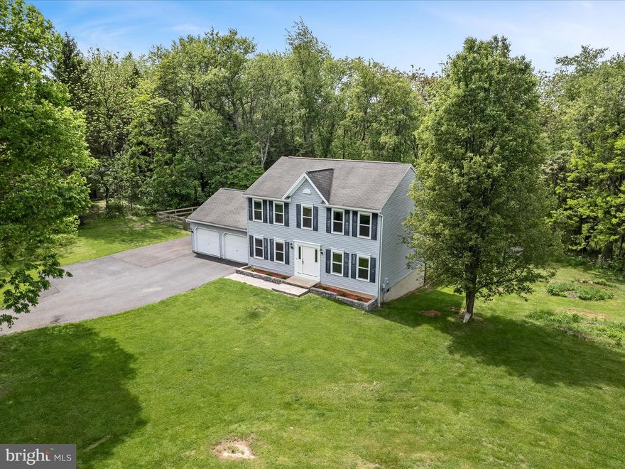 Welcome home to this beautiful 3 bedroom, 2.5 bath colonial, perfectly tucked away on 3 private acres just minutes from the charm of downtown Shepherdstown. This home offers the ideal blend of peace, privacy, and convenience. The main level features a bright and airy family room with expansive windows, seamlessly flowing into the inviting kitchen equipped with stainless steel appliances, a pantry, and a large sliding door that opens to the oversized back deck. Whether you're sipping your morning coffee while watching deer wander through the yard or hosting weekend cookouts, the outdoor space is a true highlight. You’ll also find a versatile flex room that makes a great office or formal living room, along with a separate dining room that's perfect for entertaining. Upstairs, the primary suite is a true retreat, complete with a spacious walk-in closet and ensuite bath featuring dual vanities and a linen closet. Two additional bedrooms, a full bath, and convenient upstairs laundry complete the second floor. Downstairs, the partially finished basement offers a cozy rec room ideal for movie nights or gaming, plus an unfinished space ready for your vision whether that’s a workshop, gym, or additional storage. Outside, you’ll enjoy a fenced backyard, a large storage shed, and extra parking beside the 2-car garage, perfect for your boat or camper. And if you’ve been dreaming of fresh eggs in the morning, good news-chickens are allowed! Recent updates include a brand-new architectural shingle roof (June 2025), fresh interior paint, a new front door, and all new windows throughout the home (2024). Whether you're relaxing on the deck, exploring nature, or heading into town for shopping and dining, you'll love the peaceful setting and easy access to everything Shepherdstown has to offer. Don’t miss your chance to make this private retreat yours. Schedule your showing today!