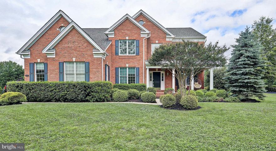 Incredible CURB APPEAL on one of the best and largest lots in all of coveted, gated Dominion Valley.  Spectacular PREMIUM, FLAT and FULLY FENCED  1/2 acre lot. 3-car SIDE-LOAD OVERSIZE garage.  Open floor with lofty ceilings is ideal for entertaining.  This house is MOVE-IN READY!  FRESH NEUTRAL Paint THROUGHOUT (walls and trim). Entire exterior has been REFRESHED (power washed, new trim, paint and stain).  Upgraded Hardwood CURVED STAIRCASE in the classy 2-story foyer.  NEW ROOF (2018) and NEWER HVAC (2015).  Beautiful kitchen with top of the line cabinetry, granite counter tops, custom tile backsplash, large center island with space for bar stools, new cooktop (2019) and new refrigerator (2019).  Kitchen opens to HUGE LIGHT-FILLED family room with 4ft. EXTENSION, SOARING 2-story ceiling and cozy gas FIREPLACE.  DUAL STAIRCASE. Generous secondary bedrooms including princess suite with en-suite bath. Would you like to have your own pool?  This HUGE FLAT yard would be perfect for your dream pool or simply to safely entertain family and friends.   GINORMOUS basement with 9ft. ceilings (unfinished) offers so much potential for your perfect design.  Conveniences abound with shopping, dining, banking and day care within the community.  Just off Rt. 66 and Rt. 15 near commuter lots.  Community boast amazing recreational amenities:  Pools, Tennis, Walking Trails, Fitness Center, Indoor and outdoor basketball, tot lots, golf course (memberships available).